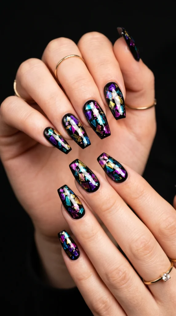 Coffin nails in glossy black with iridescent multicolor foil shards stained glass effect baddie editorial