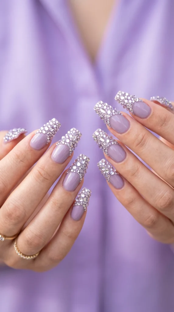 Coffin nails in soft lilac with dense crystal rhinestone cluster tips building from edge for glamorous luxury