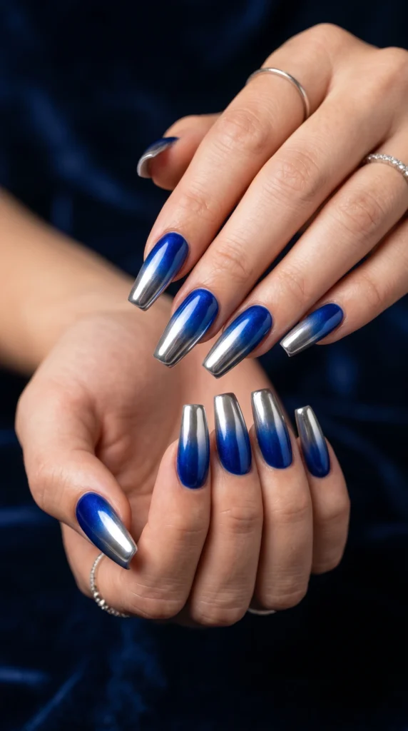 Coffin nails with electric blue to silver chrome ombre gradient futuristic bold stunning nail art
