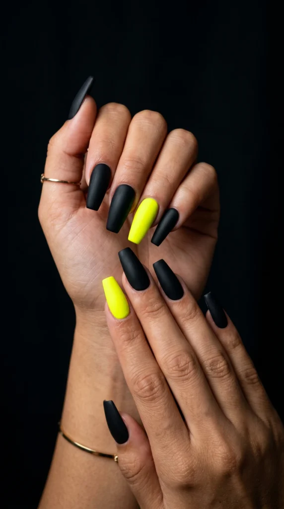 Coffin nails in matte black with neon yellow accent nail electric high fashion contrast stunning