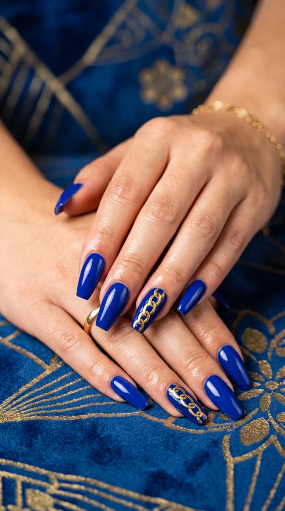 Coffin nails rich cobalt blue with gold chain link art accent nails designer jewelry bold mood
