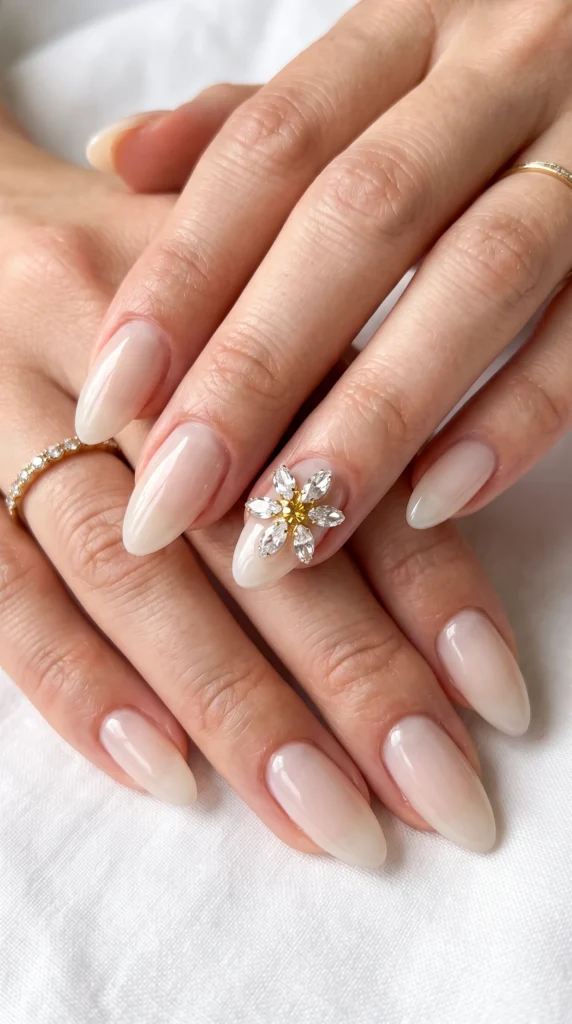 A woman with a ring on her finger is holding her nails.