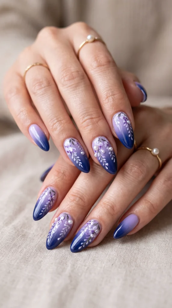 A woman with purple and blue nails.