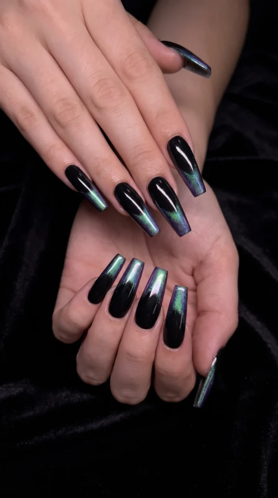 A person with black and green nails.