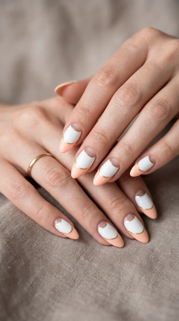 A woman's hand with a ring on her finger and pink nail polish.