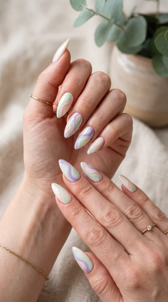 A woman with painted nails and a ring on her finger.