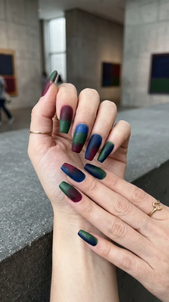 A woman with multi-colored nails.