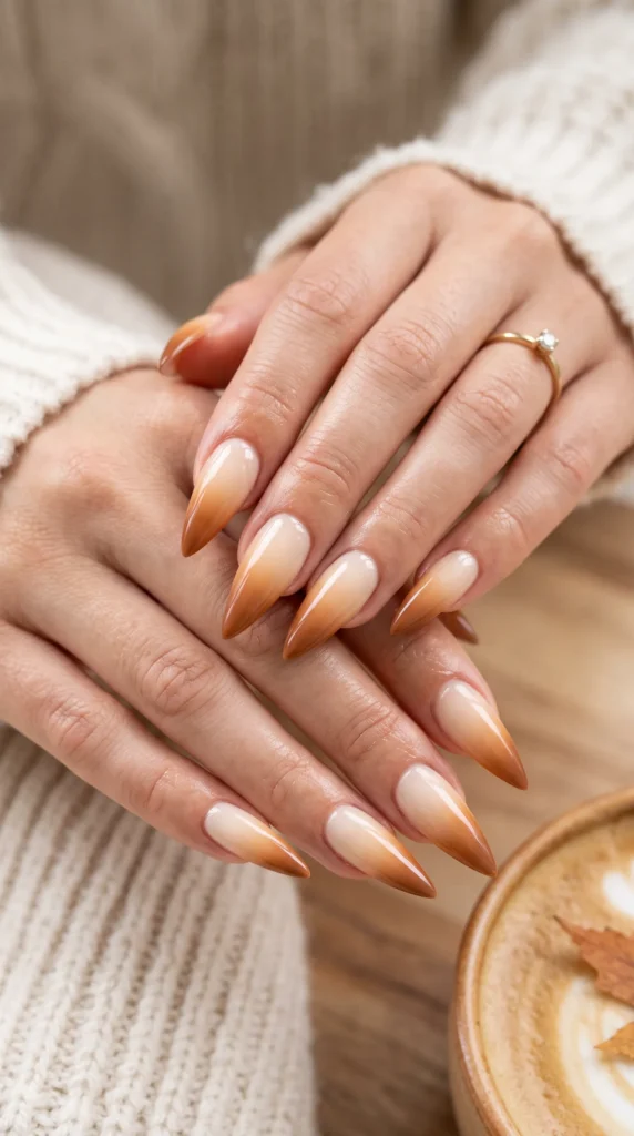 A woman with painted nails holding her hand up.