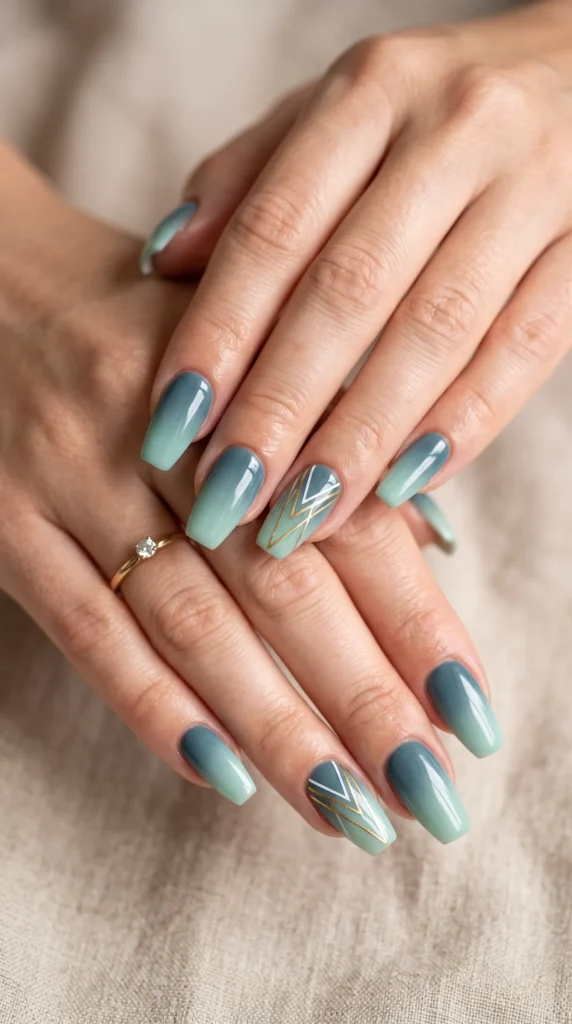 A person with blue and green nail polish on their fingers.