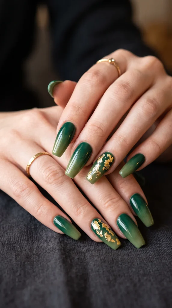 A woman with green nail polish and gold accents.