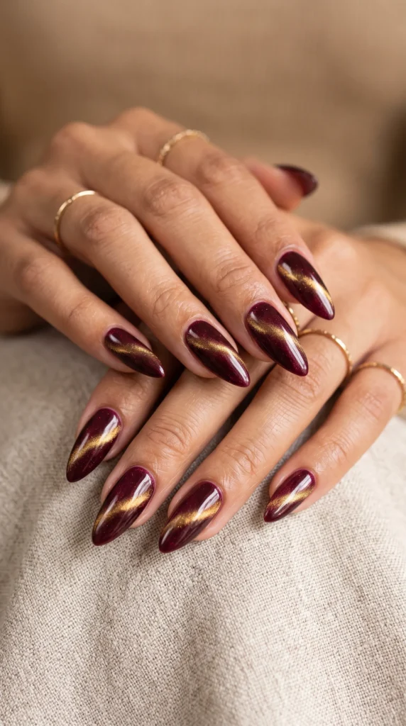 A woman with red nails and gold rings.
