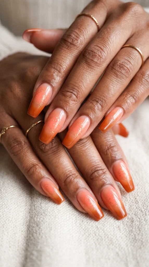 A woman with orange nails.